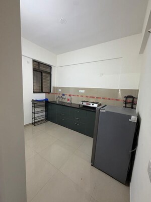Kitchen in 2 BHK Apartment at Gulmohar Goldcoast, Kharadi – for Rent