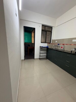 Kitchen in 2 BHK Apartment at Gulmohar Goldcoast, Kharadi – for Rent
