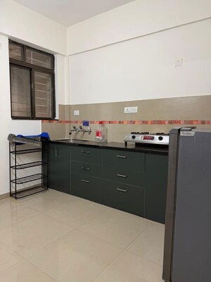 Kitchen in 2 BHK Apartment at Gulmohar Goldcoast, Kharadi – for Rent