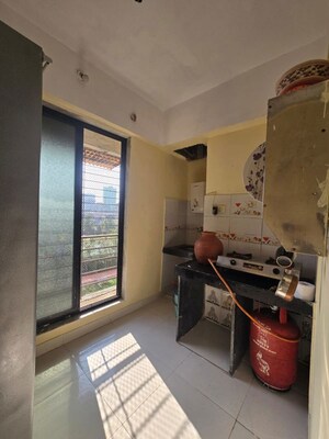 Kitchen in 2 BHK Apartment at Sankalp CHS Kopar Khairane, Kopar Khairane – for Sale