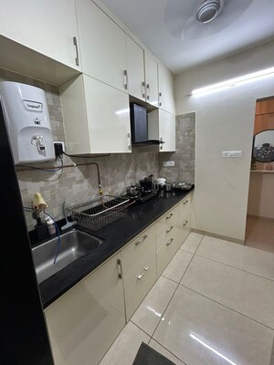 Kitchen in 3 BHK Apartment at Zircon Ventures CHS Ltd, Viman Nagar – for Rent