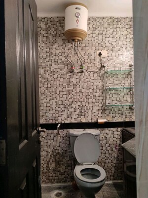 Bathroom in 3 BHK Apartment at Orchid Petals, Sector 49 – for Rent