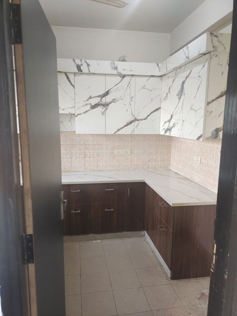 Kitchen, paramount-golf-foreste-apartments 3.5 Bedroom 1742 Sq.Ft. Villa In Zeta I Greater Noida Greater Noida 10732220