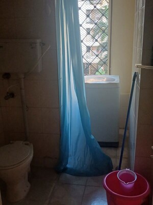 Bathroom in 2 BHK Apartment at Eden Woods complex, Manpada – for Rent