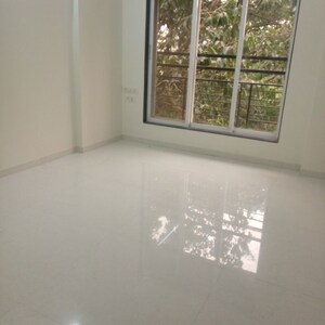 Room in 2 BHK Apartment at Man SN Saket CHS, Goregaon West – for Rent