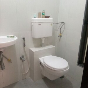 Bathroom in 2 BHK Apartment at Man SN Saket CHS, Goregaon West – for Rent