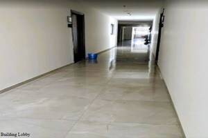 Building Lobby in 1 BHK Apartment at Duville Riverdale Heights, Kharadi – for Rent