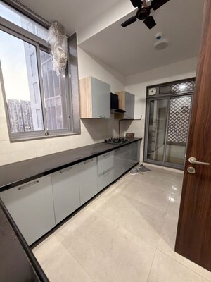 Kitchen in 3 BHK Apartment at Piramal Vaikunth Vraj, Balkum Pada – for Rent