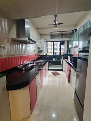 Kitchen in 3 BHK Apartment at Atul Grandura Apartment, Baner – for Rent