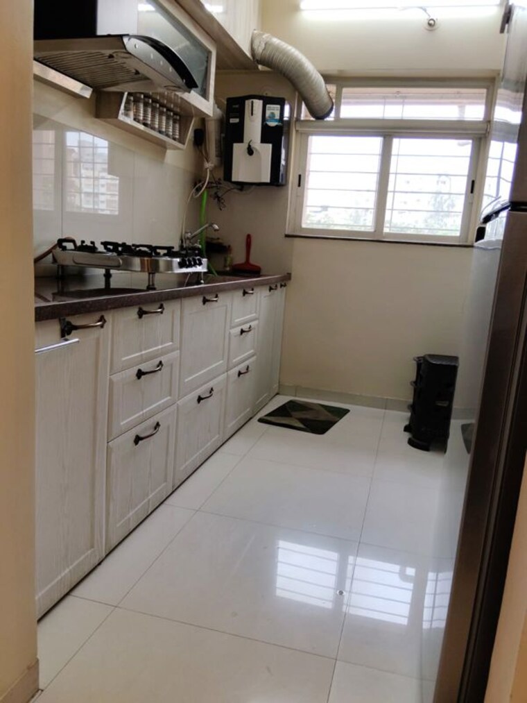 Kitchen, puraniks-aldea-espanola-phase-5 2 Bedroom 638 Sq.Ft. Apartment In Baner Pune 10732489