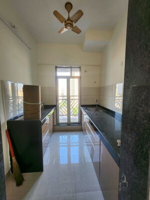 Kitchen in 1 BHK Apartment at Pride Larkins Nest, Ghodbunder Road – for Rent