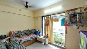 Living Room in 1 BHK Apartment at Falsa Scarlett Homes, Dahisar East – for Sale