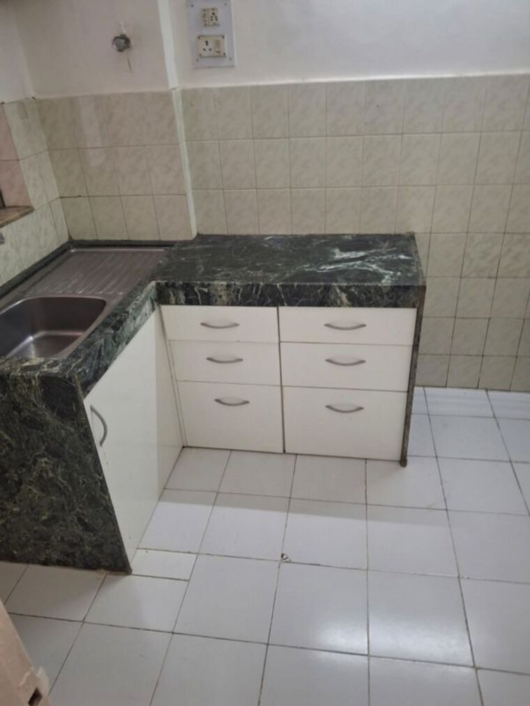 Kitchen, ramesh-hermes-heritage-phase-2 1 Bedroom 648 Sq.Ft. Apartment In Shastrinagar Pune 10732707