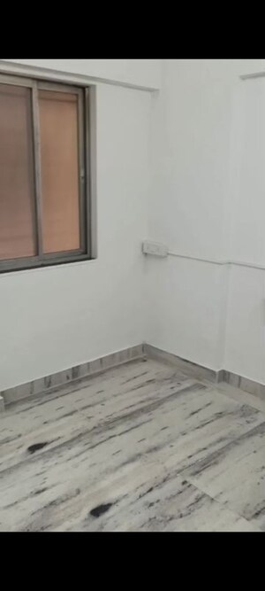 Room in 1 BHK Apartment at Pragati Kavya Residency, Vile Parle East – for Rent