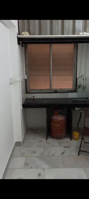 Kitchen in 1 BHK Apartment at Pragati Kavya Residency, Vile Parle East – for Rent