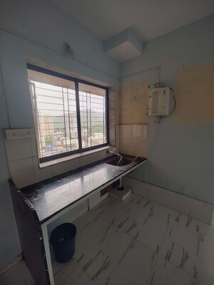 Kitchen in 2 BHK Apartment at Royal Palms Garden View, Goregaon East – for Sale