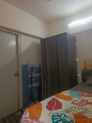Bedroom in 2 BHK Apartment at Royal Palms Garden View, Goregaon East – for Rent