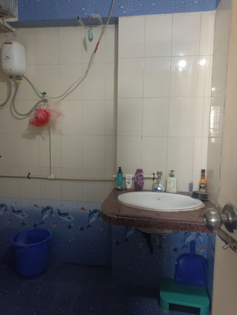 Bathroom, royal-palms-garden-view 2 Bedroom 765 Sq.Ft. Apartment In Goregaon East Mumbai 10732784
