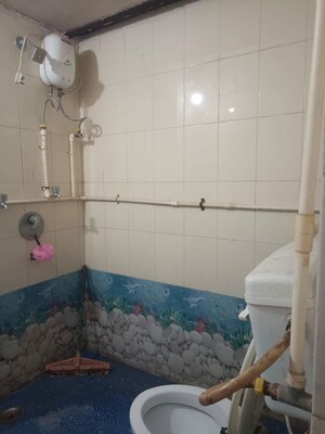 Bathroom in 2 BHK Apartment at Royal Palms Garden View, Goregaon East – for Rent