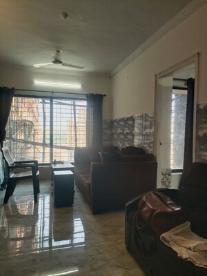 Living Room in 2 BHK Apartment at Royal Palms Garden View, Goregaon East – for Rent
