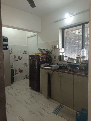 Kitchen in 2 BHK Apartment at Royal Palms Garden View, Goregaon East – for Rent
