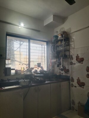Kitchen in 2 BHK Apartment at Royal Palms Garden View, Goregaon East – for Rent