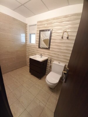 Bathroom in 4 BHK Apartment at Elite Golf Green, Sector 79 – for Rent