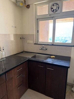 Kitchen in 2 BHK Apartment at Hiranandani Meadows, Manpada – for Rent