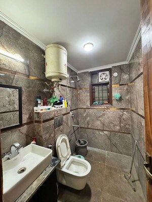 Bathroom in 2 BHK Builder Floor at Chattarpur – for Rent