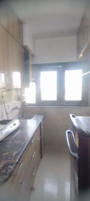 Kitchen in Studio Apartment at DLF Capital Greens Phase I And II, Moti Nagar – for Rent