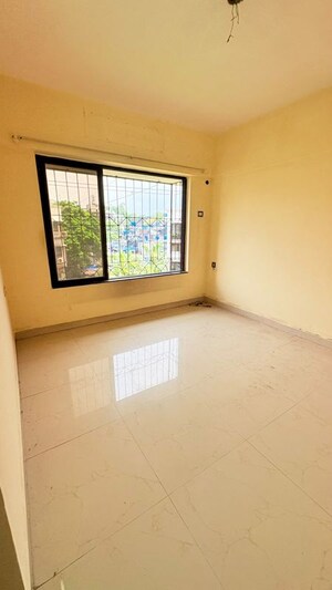 Room in 2 BHK Apartment at Atul Trans Residency, Andheri East – for Rent