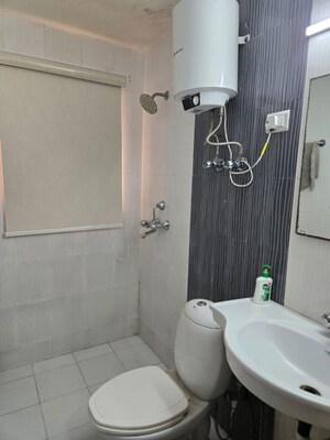 Bathroom in Studio Apartment at Infinity Krishna Bhumi Arcade, Sunrakh Bangar – for Sale