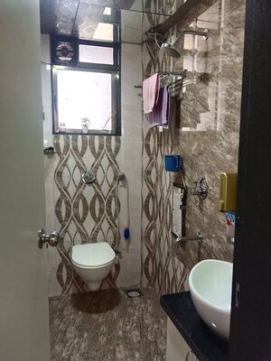 Bathroom in 2 BHK Apartment at Chandak Sparkling Wings, Dahisar East – for Rent
