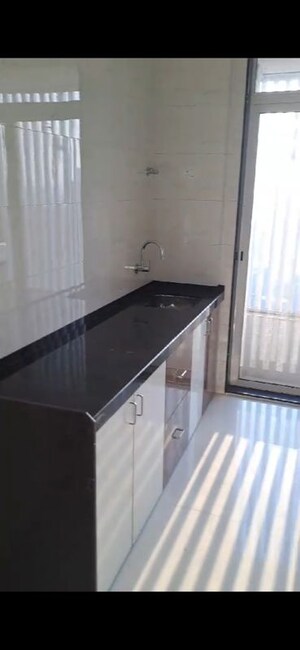 Kitchen in 2 BHK Apartment at Shreeji Atlantis, Malad West – for Sale