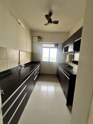 Kitchen in 1 BHK Apartment at Lodha Splendora, Ghodbunder Road – for Rent