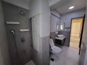 Bathroom in 2 BHK Apartment at Cosmopolis Tower, Andheri West – for Rent