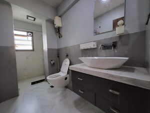 Bathroom in 2 BHK Apartment at Cosmopolis Tower, Andheri West – for Rent