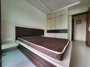 Bedroom in 2 BHK Apartment at Cosmopolis Tower, Andheri West – for Rent