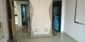 Building Lobby in 2.5 BHK Apartment at Oshiwara Mhada, Andheri West – for Rent