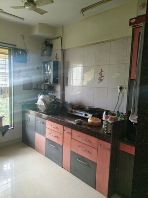 Kitchen in 1 BHK Apartment at Venus Upvan CHS, Gawand Baug – for Rent