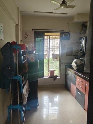 Living Room in 1 BHK Apartment at Venus Upvan CHS, Gawand Baug – for Rent