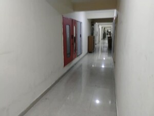 Building Lobby in 1 BHK Apartment at Eureka Diya Green City, Raj Nagar Extension – for Sale