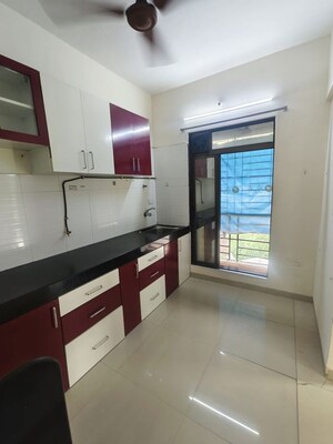 Kitchen in 2 BHK Apartment at Kamdhenu Eden Garden, Kharghar – for Rent