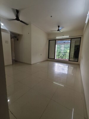 Living Room in 2 BHK Apartment at Kamdhenu Eden Garden, Kharghar – for Rent
