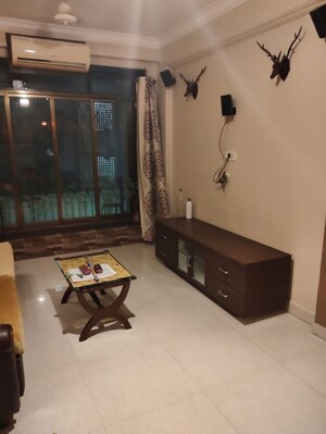 Living Room in 1.5 BHK Apartment at Bandra West – for Rent