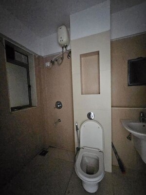 Bathroom in 1 BHK Apartment at Raunak Delight, Owale – for Rent