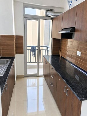 Kitchen in 3 BHK Apartment at Amrapali Terrace Homes, Tech Zone 4 Greater Noida – for Rent