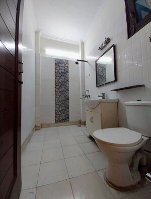 Bathroom in 4 BHK Builder Floor at Niti Khand I – for Rent