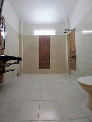 Bathroom in 4 BHK Builder Floor at Niti Khand I – for Rent