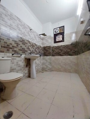 Bathroom in 4 BHK Builder Floor at Niti Khand I – for Rent